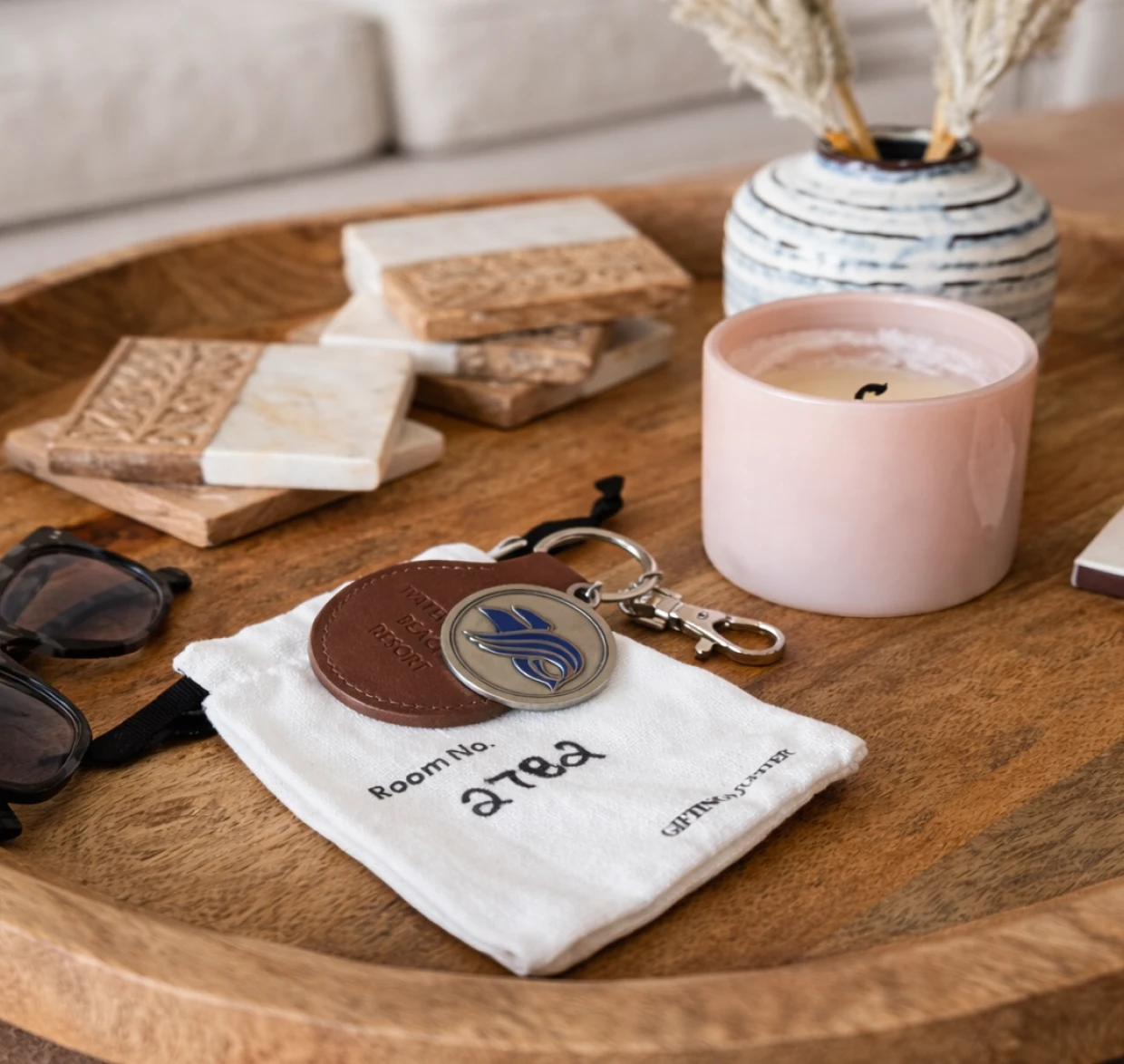 Sunglasses and coasters on a tray